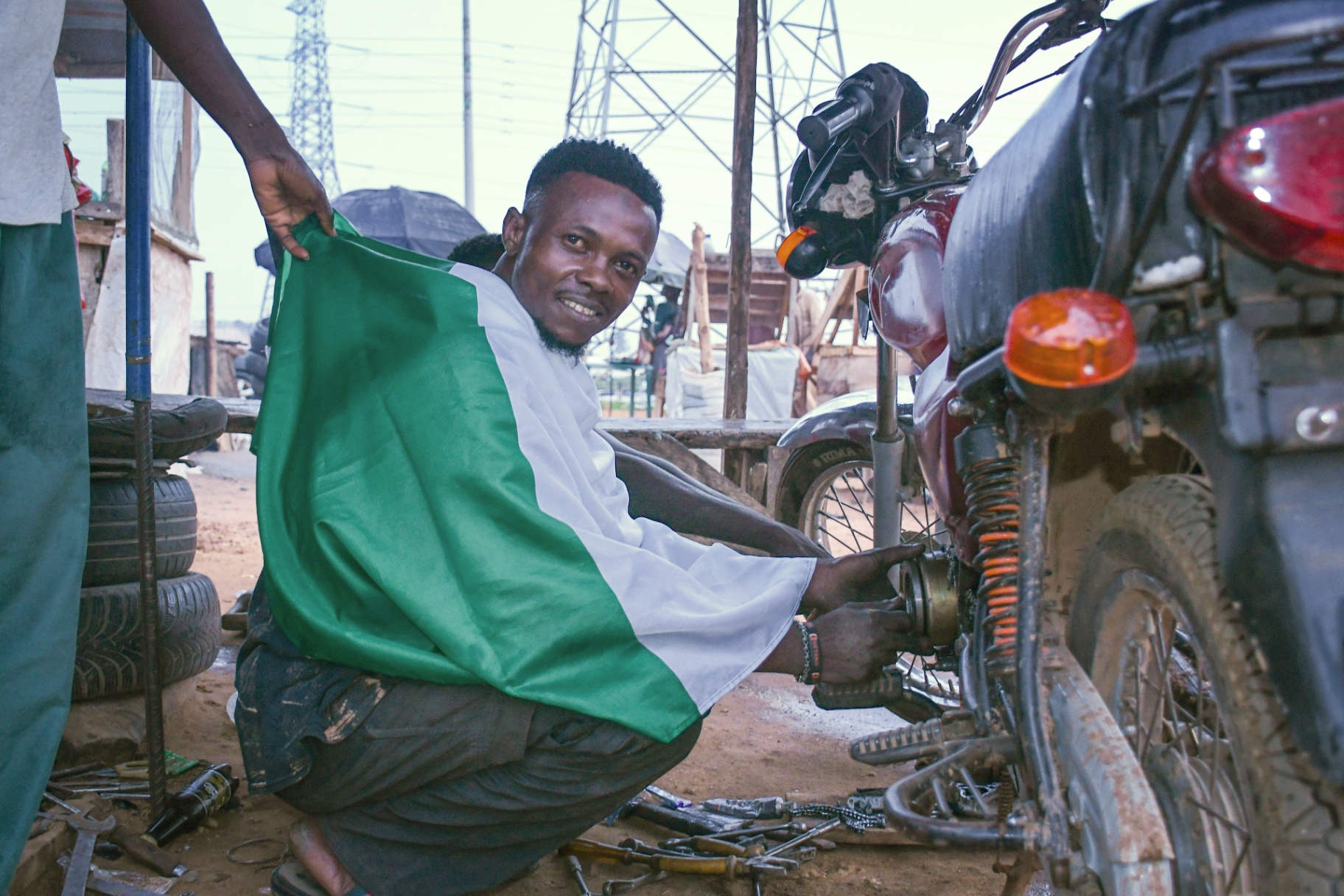 The Mechanic and the Flag , Lugbe (Airport Road), FCT