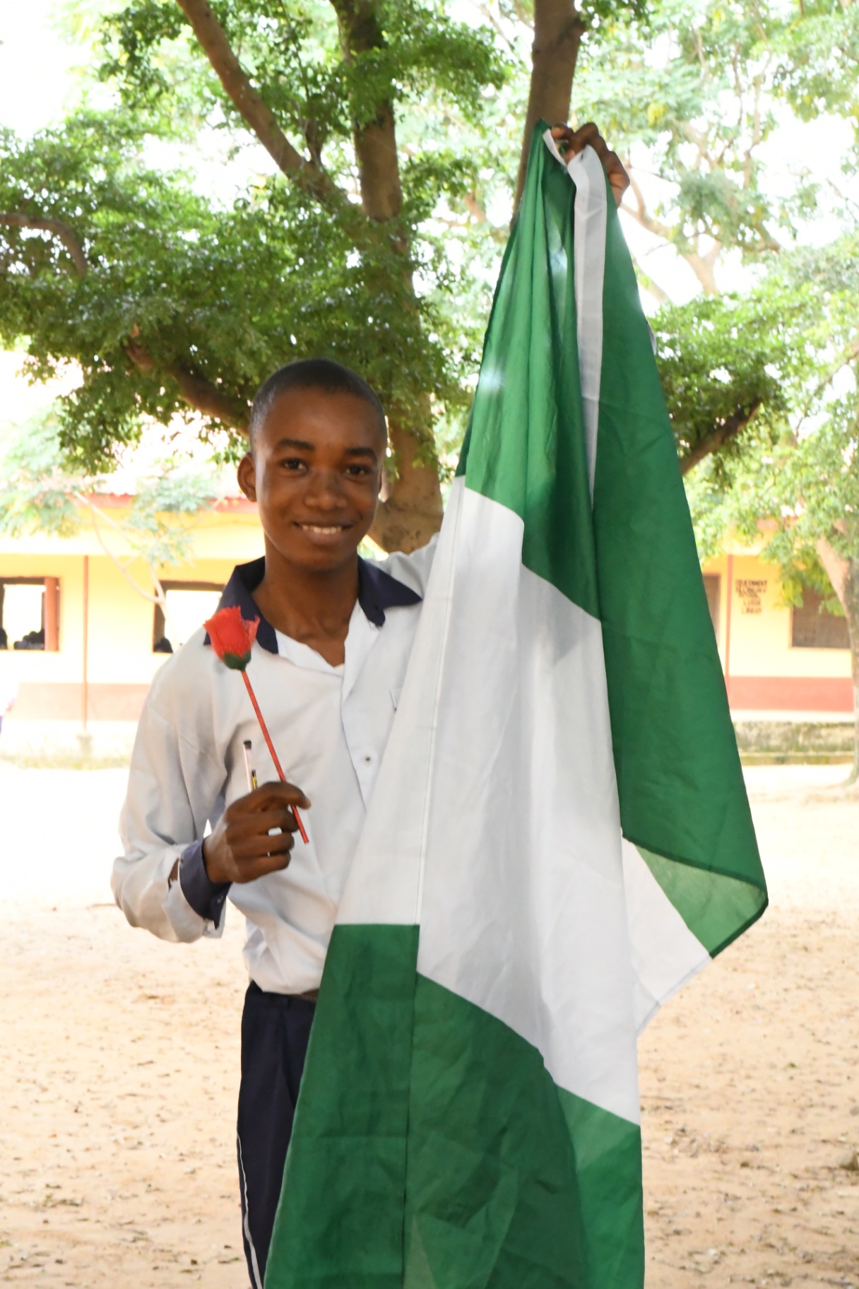 Rose in Hand, Flag on High , Lugbe (Airport Road), FCT