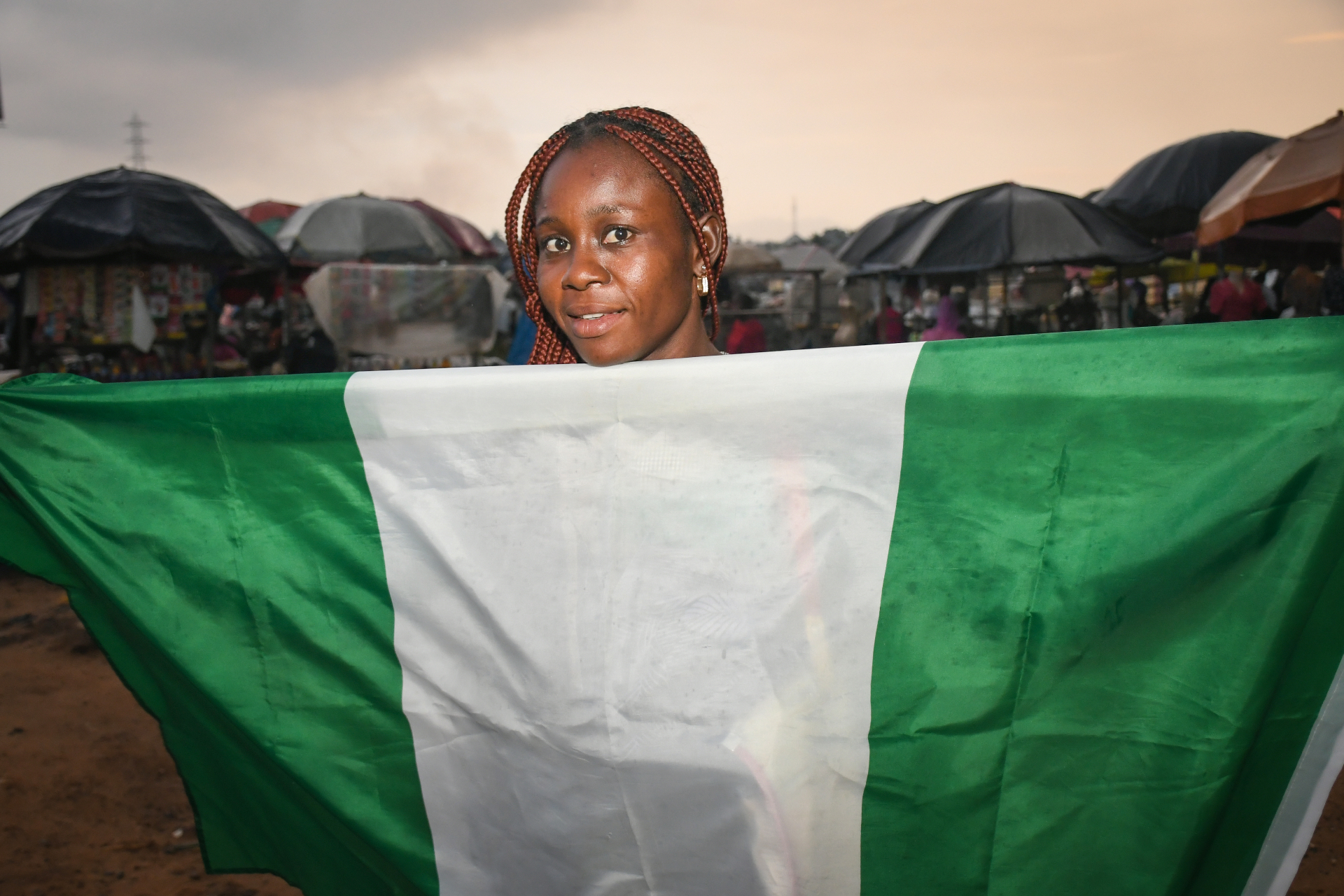 The POS Woman Who First Refused the Flag , Lugbe (Airport Road), FCT
