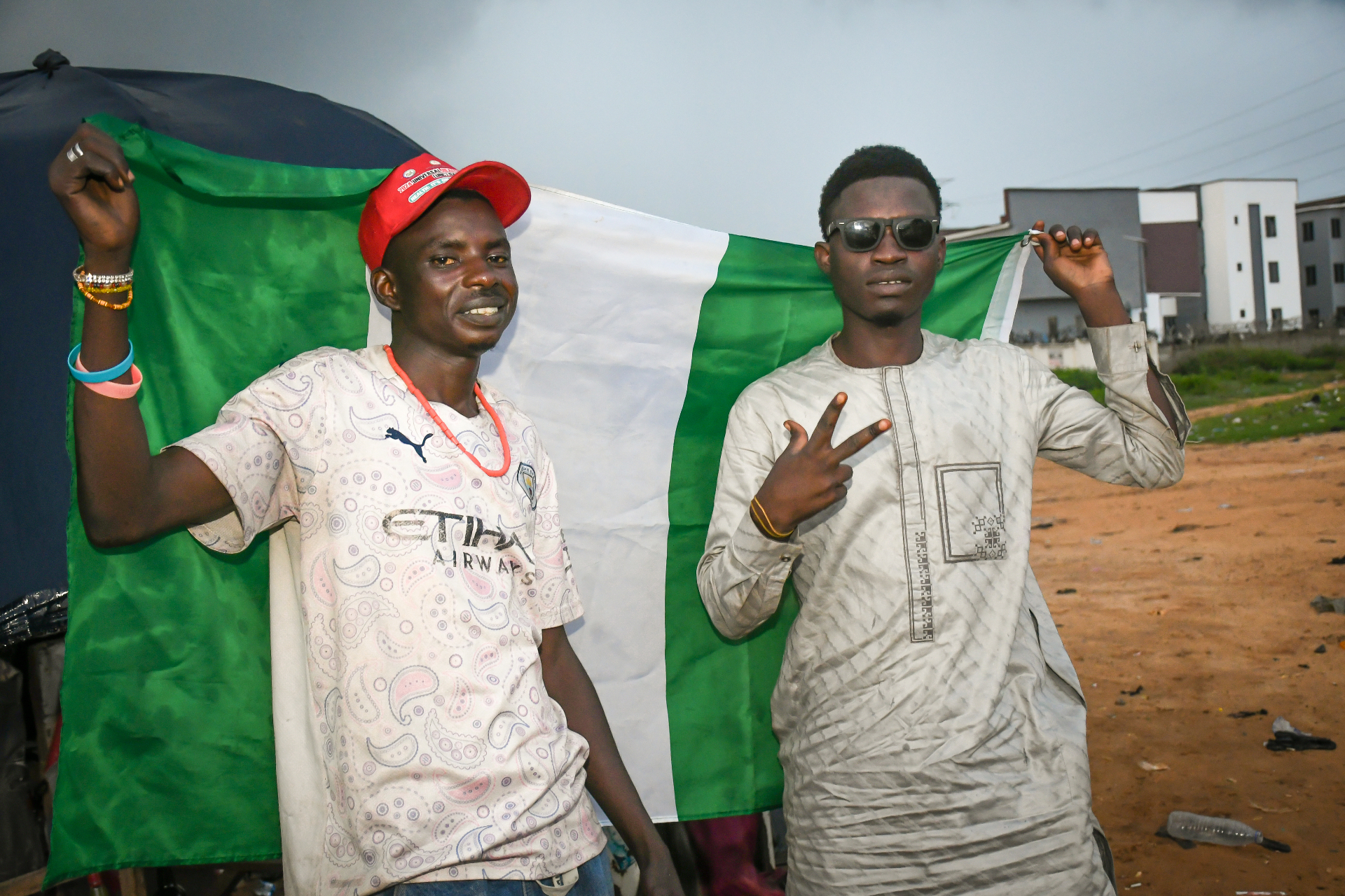 Two Brothers, One Flag Between Them , Lugbe (Airport Road), FCT